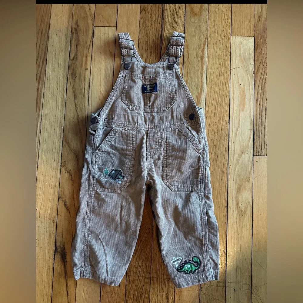 Oshkosh B’gosh Boy’s Size 12M  Tan Overalls w Dinosaurs Embroidery
